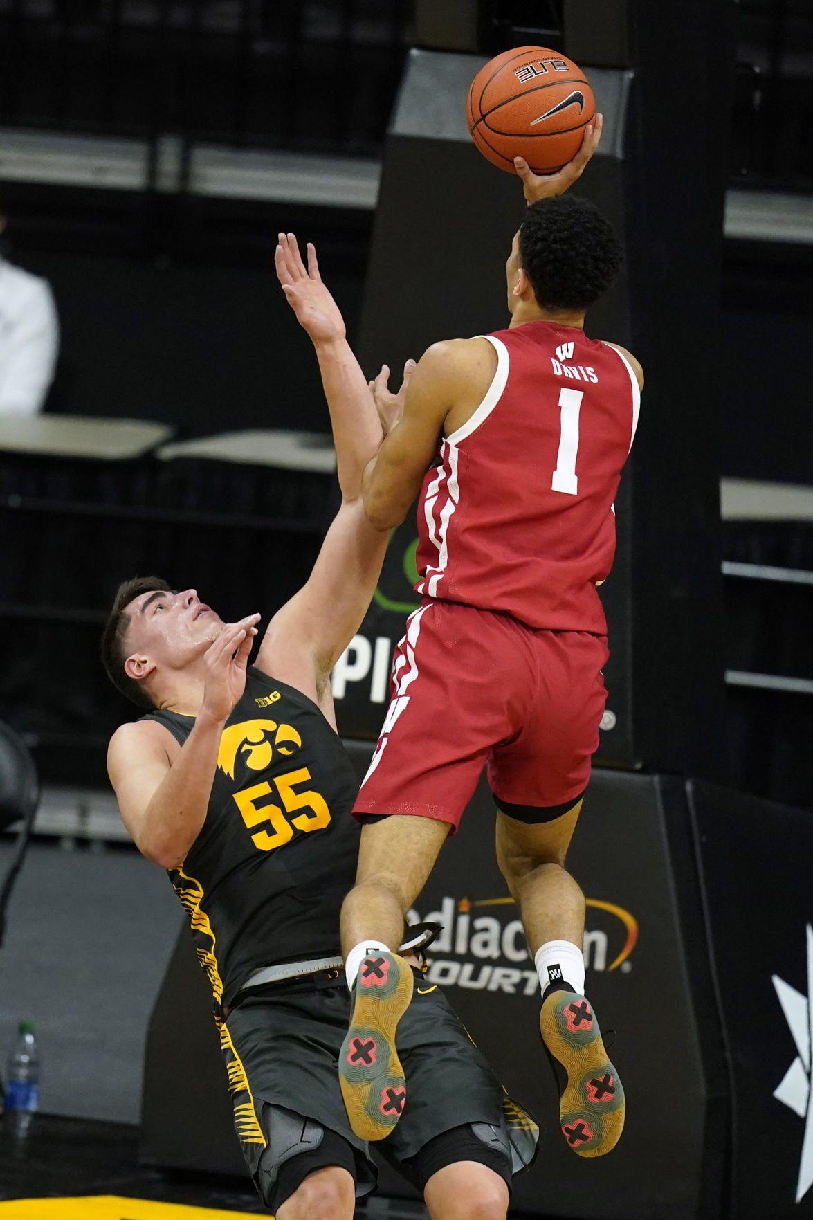 Iowa 77, UW 73